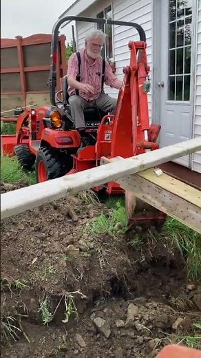 Kubota BX Backhoe Skills Test: Trenching Next to the Shed