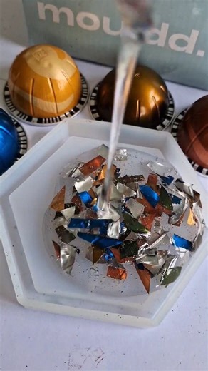 Anyone else think the coffee pods are just too pretty to throw away? And I use the coffee grounds to add to my plants so it's a win win Using @mouldd_resin for that glass like finish and hexagon silicone coaster moulds #resincoasters #coasters #resin #craftidea | Lily Minilli