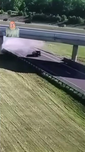 Dump Truck Hits Bridge