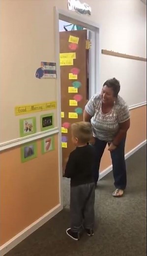 Teacher greeting her students with special handshakes & hugs before class! | #Shorts