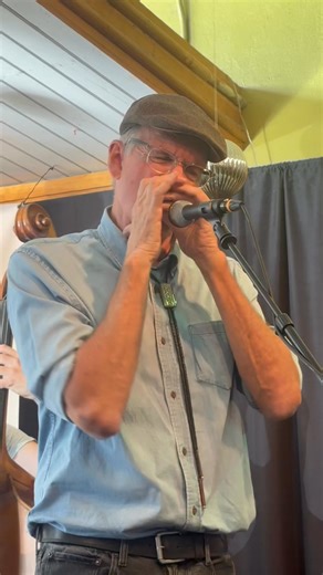 You might know his voice from NPR, but have you ever seen the flying fingers of John Burnett? I catch him every chance I get, and it never gets old watching him pick a harmonica from his case (which holds a dozen) and making it sing. I caught a bit of his latest show with Bluesette (named for a jazz standard by the Belgian jazz musician Toots Thielemans, also famous for playing the chromatic harmonica) at NeWorlDeli yesterday. Even better? His wife Margaret Justus joined him on stage for a few n