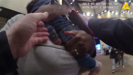 An officer saved a baby's life at a movie theater. Now, he's part of the family