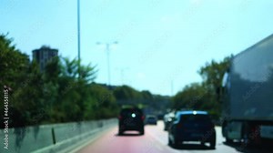 Texture blur, highway and road, cars and transport, roadside and gray asphalt, blue sky on a summer day