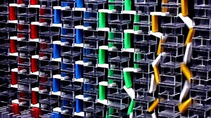 A Satisfying Demonstration of Vertically Arranged Domino Pyramids and Squares Toppling to the Ground