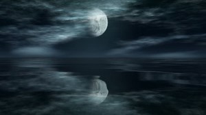 clip-241435-moon-time-lapse-reflection-over-ocean