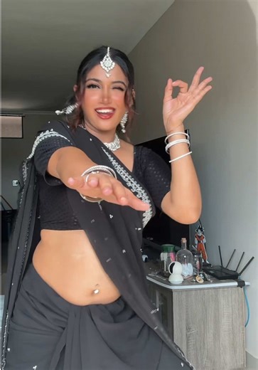 Pregnant Bollywood Vibes in a Black Saree