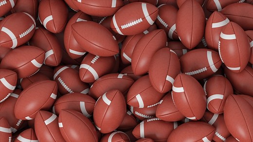 Why is a football called a pigskin?