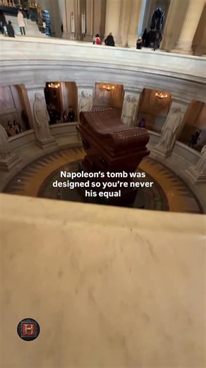 historytv8tins on Instagram: "“You’re either bowing to him or looking up at him. 🤯🇫🇷” Did you know Napoleon’s tomb was specifically designed to ensure you’re never his equal? To see the sarcophagus from the upper terrace, you’re forced to lean over the railing—mimicking a bow of respect. If you view it from the crypt floor below, the massive 16-foot height forces you to look up in awe. Even in death, the Emperor wanted to command the room. Located under the golden dome of Les Invalides, this 