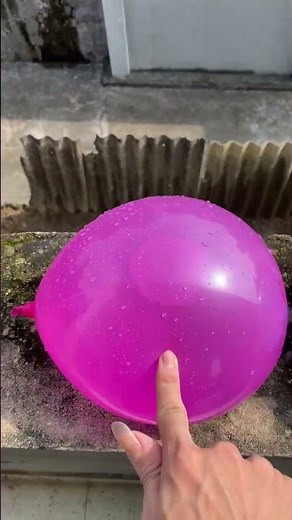 Experiment: Will a water balloon explode when it rolls down from a tall building? 💥🎈#baloon