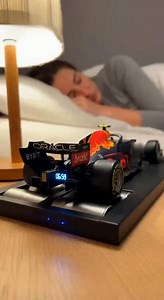⚡ Wake Up Like a Champion – Red Bull F1 Racing Alarm Clock! 🏎️🔥 Start your day on the podium! This 1:18 scale Red Bull Racing replica alarm clock brings F1 energy to your bedside: authentic blue/red/yellow livery, immersive engine roar alarm (“Lights Out” & podium cheers), customizable LED display, app control for time/brightness/sound, and tactile snooze (press the hood for 5 more mins)! ⏳ Limited stock! Shop Now 👉https://t.site/4qJLHjt | Accustomedt