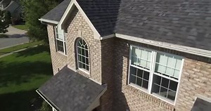 Relaxing on the porch. Being one with nature. An ageless grace that never disappoints. That is the feel of Williamsburg Gray, naturally inspired and rich in history. 🌊🏔️ Learn more about Williamsburg Gray, the 2024 Shingle Color of the Year: https://bit.ly/3MaalHH | Owens Corning Roofing