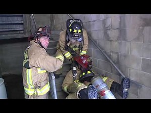 Moving a Down Firefighter Up Stairs