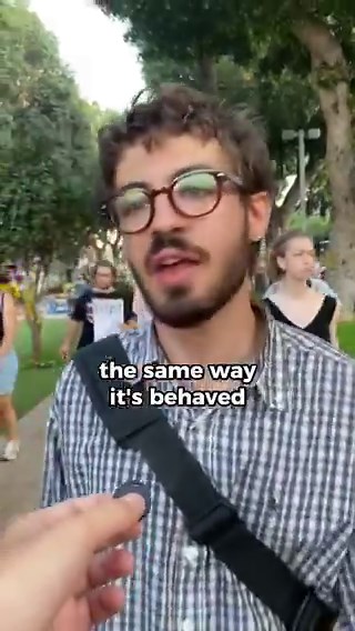 Young refuseniks burn their IDF draft papers in the middle of Tel Aviv in IsraelThey refuse to serve in the Israeli Forces to kill children in Palestine and Lebanon and are willing to go to military jail for their position