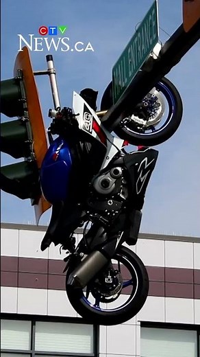Motorcycle dangles from traffic light after B.C. crash