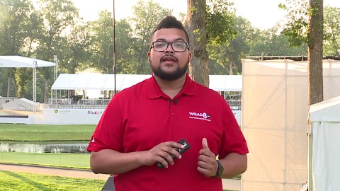 Golf technicians set up live cameras to track tournament data