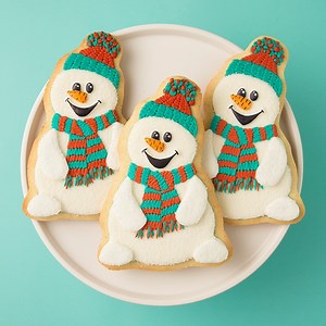 175K views · 3K reactions | Aren’t these cute?? This snowman cookie decorating tutorial is part of a collaboration with my friends Haniela's and Marlyn of Montreal Confections. We each created our own version of one snowman cookie drawing using the same color palette – red, teal, orange, and black. Watch the full tutorial and get the supply list on my blog! https://www.sweetambs.com/tutorial/snowman-cookie-decorating-tutorial/ | SweetAmbs | Facebook