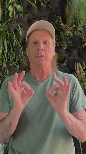 How does Adrian Belew like to spend his time off in Europe?