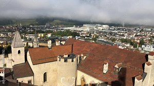 Panoramic view of the city Brunico - Bruneck with the clouds above in the Puster Valley, South Tyrol, Italy