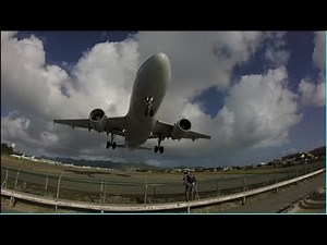 Insanely Low Takeoff from St. Maarten (SXM) in Opposite Direction over Maho Beach
