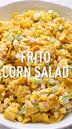 This Frito Corn Salad recipe is filled with corn, peppers, onion, and crushed Fritos. Drop recipe to get it. https://www.the-girl-who-ate-everything.com/frito-corn-salad/ | The Girl Who Ate Everything