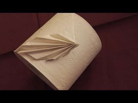 Folding toilet paper into an origami fan
