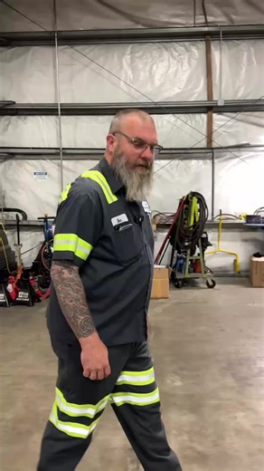 Skilled Mechanic Working on Vehicles