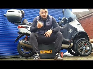 How to replace the rear brake pads on Piaggio MP3 500cc