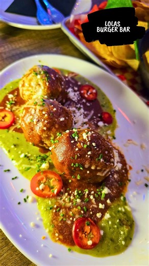 Mari | ATL Foodie on Instagram: "✨ Step into the holiday magic at Lola’s The North Pole 🎄 Lola’s Burger and Tequila Bar (@lolasburgerbar) transformed their upstairs into a festive holiday pop up, full of cozy vibes, twinkling lights, and a Christmas inspired menu that is perfect for the season. I tried the Peppermint Mocha Espresso Martini, Gingerbread White Russian, and Jingle Bell Nog, all festive, flavorful, and perfect for a holiday night out. For bites, the Deck the Halls Meatballs, North 