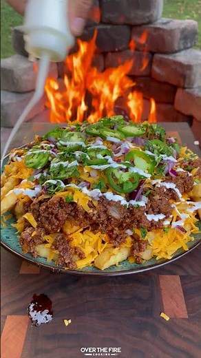 Loaded Chili Cheese Fries Recipe | Over The Fire Cooking by Derek Wolf