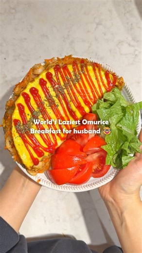 bear_wife on Instagram: "Breakfast for husband day 27 - Omurice 1️⃣ Cook in the Rice Cooker (Multi-cook mode / 10 mins) - Leftover rice + Chopped sausages + leftover veggies (carrots, zucchini, onion, mushrooms) + 2 tbsp ketchup - 2eggs - cheese *If using cold rice, multi-cook rice and veggies for 10 min, then add eggs and cook for 5 more min. 2️⃣ Plating - Flip it onto a plate, and cover the rice with the beautifully cooked egg side facing up - Drizzle with more ketchup and a sprinkle of parsle