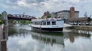 Saturday Night on the Canal: Beautiful evening ahead of the storms along the historic Erie Canal in Fairport, NY. The iconic Lift Bridge is raised for the Colonial Belle tour boat. Keep watching and you'll hear a train and see more boats. Had a terrific dinner at My Wine & Cheese Bar overlooking this spectacular waterway. Their grand opening is tomorrow—I highly recommend this to folks who are from the area or plan on visiting this summer. Live music Wednesday-Saturday evenings My Wine and Chees