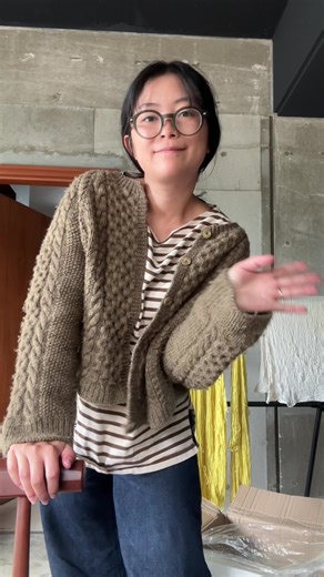 A lil’ try-on of my current wip! I feel like it fits a little funky rn bc of the lack of front/neck bands but I’m sooo excited to wear this 🥹 🧶: #jeanettecardigan by @morecaknit using “Oshiruko” on SWM DK & Suri Silk Lace 🍬“Oshiruko” will be available with the rest of the Japanese Snack Collection on Jan. 24th @ 9am JST. This preorder update will have an 8-10 week turnaround time, so the listings will be up for one week or until I reach capacity. Find it on biglittleyarn.com 🍬 #Handdyedyarn 