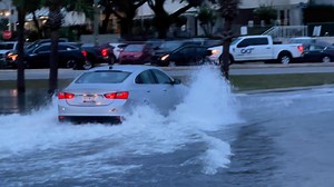 Charleston, SC- Driving through water with the front windows down. Hopefully water didn’t get inside. 🛣️🌊 #LockwoodBlvd | Trooper Bob - ABC News 4 Traffic Tracker