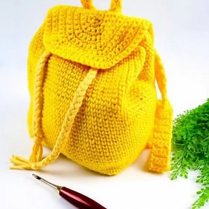 1.8K views · 21 reactions | Here's a fun and functional pattern, the Little Backpack! Get the pattern here to make your own! https://www.nickishomemadecrafts.com/little-backpack-crochet/ | Crochet Patterns & Tutorials by Nicki's Homemade Crafts | Facebook