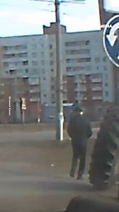 17K views · 76 reactions | While walking carelessly, a man was nearly struck by a large wheel that suddenly detached from a tractor. | The Witness | Facebook