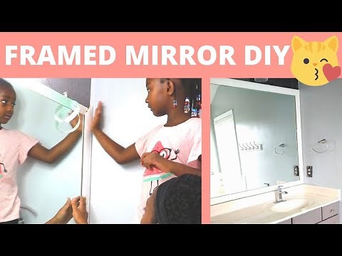 How We Framed Our Large Bathroom Mirror (WITHOUT GLUE!) | DIY Power Couple