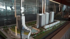 2021-11-01 - Iskele, Northern Cyprus. Grand Sapphire Resort Architectural scale model displays urban development with high-rise buildings surrounded by green landscapes, , d indoors.