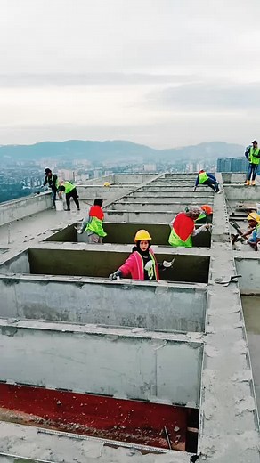 Construction Workers on High-Rise Rooftop Activities
