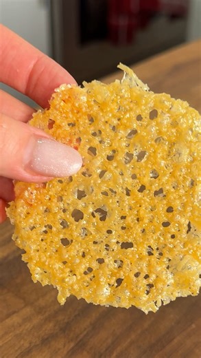 Alessandra Ciuffo on Instagram: "Frico...a crispy cracker made from just Parmigiano-Reggiano PDO, heat, and a little patience. Made from cow’s milk and aged for at least 12 months, Parmigiano-Reggiano PDO develops a rich, nutty savoriness with delicate crystal pockets that melt seamlessly into dishes, adding depth and umami. It’s one of my personal favorite cheeses and also the one and only ingredient of this amazing recipe. Comment “PARM” or “FRICO” to get the full recipe + method sent directly