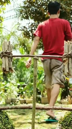 process of creating a creative photo of a mini human carrying firewood crossing a single-log bridge