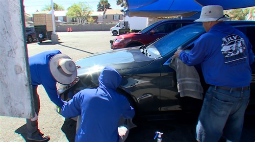 Vegas workers gear up, working outside in historic March heat