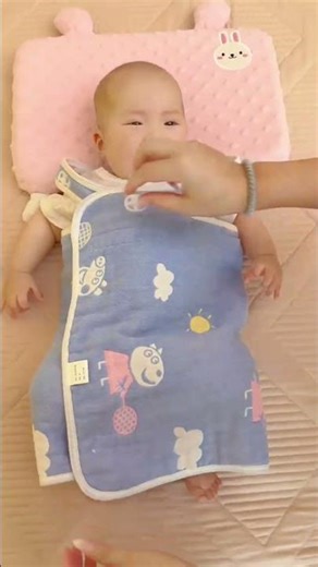 It's getting hot and my baby keeps kicking off the blankets, leaving his tummy exposed.