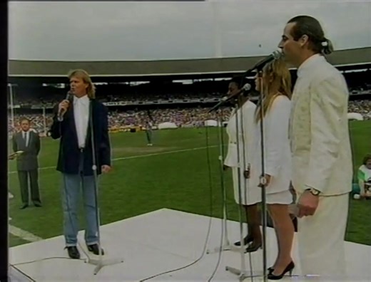 John Farnham singing at the 1989 VFL Grand Final. | RFCHistorian