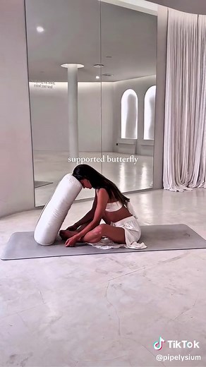 We often try to stretch tension away. But tension isn’t only muscular. It’s neurological. Your nervous system is always listening… gently scanning for safety or threat. When it senses stress, breath becomes shallow. Muscle tone rises. Movement subtly contracts. So unwinding isn’t about forcing yourself to relax. It’s about softening the message you’re sending. These exercises feel especially nourishing when paired with slow, intentional breathing: 1. Supported Heart Opener Let yourself be fully