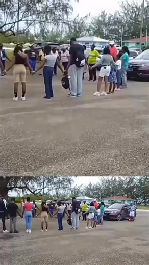 GATHERED TO PRAY: While awaiting their evacuation flight from Crooked Island to New Providence, residents gathered at the airport to pray concerning Hurricane Melissa. | Eyewitness News Bahamas