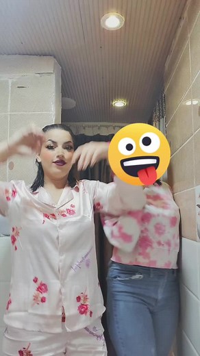 Engaging Dance Routine in Pink Pajamas and Tie-Dye