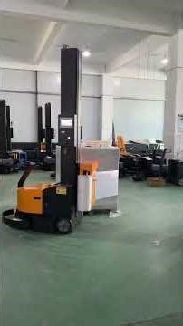 Adjustable tension self-propelled stretch wrap machine