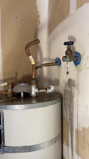 Soldering the valve for a water heater. Guidelines from California’s Division of the State Architect strongly recommend that code-compliant flexible connectors be used when attaching the water heater to any water, gas, or electrical lines. So that’s why we’re using flex lines and we have the state approved earthquake bracing system installed. Make today a great day! | Evan Berns