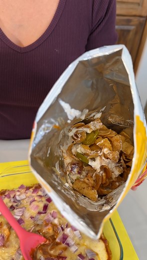 Super easy, delicious Frito pie Olivia uses chili with no beans, jalapeno pepper jack cheese, red onions, Fritos, sour cream and jalapenos to make a yummy Frito pie to go. This original video was produced by Network Media LLC and Olivia | Olivia