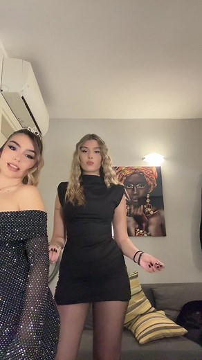 Joyful Dance Party in Elegant Black Dresses